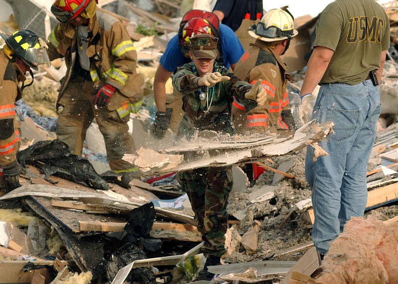 6. Searching for any signs of life in the debris of this mobile home park destroyed by the powerful tornado. November 6, 2005, Evansville, State of Indiana, USA. Photo Credit: Photographer's Mate 2nd Class Joseph C. Garza, Navy NewsStand - Eye on the Fleet Photo Gallery (http://www.news.navy.mil/view_photos.asp, 051106-N-1755G-002), United States Navy (USN, http://www.navy.mil), United States Department of Defense (DoD, http://www.DefenseLink.mil or http://www.dod.gov), Government of the United States of America (USA).