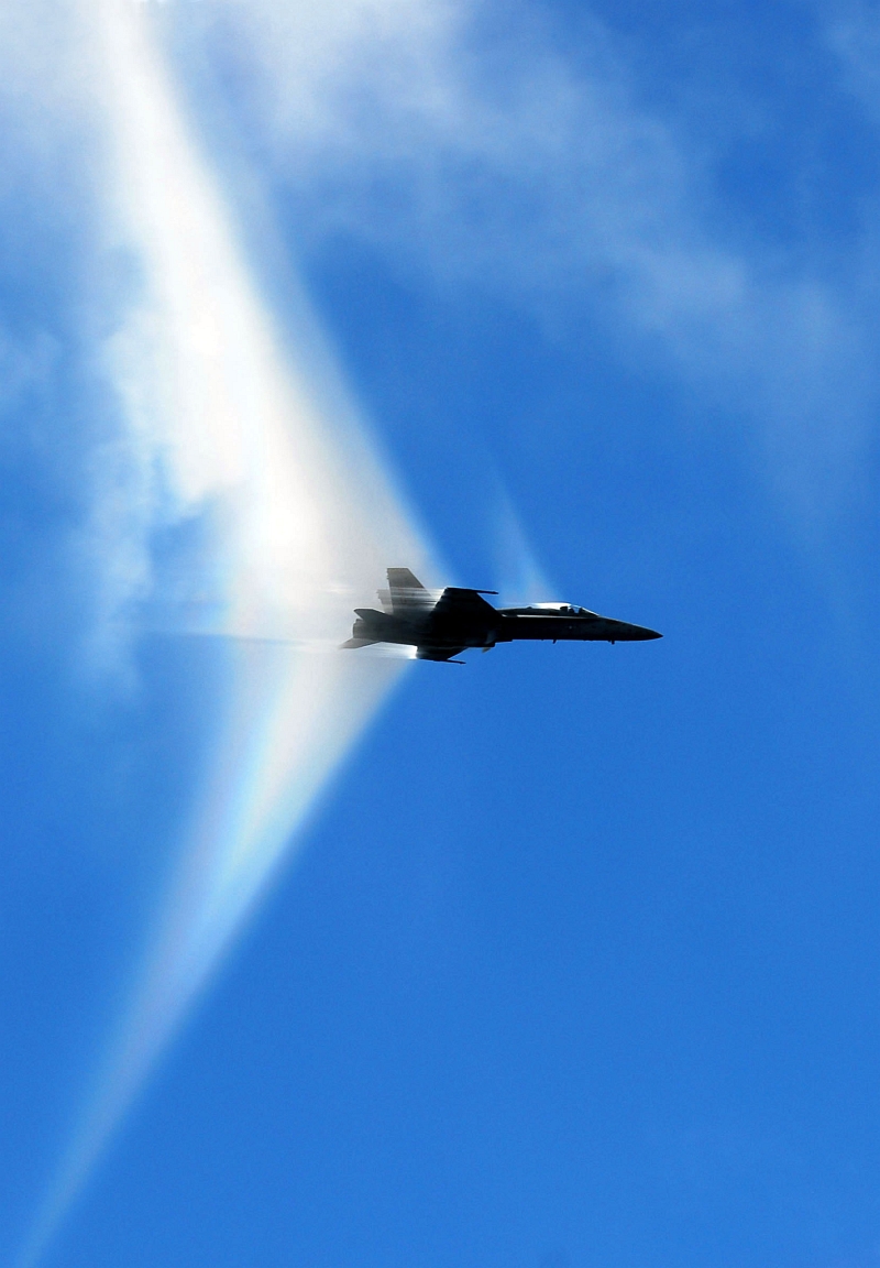 15. A Transonic U.S. Navy F/A-18C Hornet Fighter Jet Assigned to the 'Argonauts' of Fighter Squadron 147 (VFA-147) Executes A High-Speed Flyby Near the U.S. Navy Aircraft Carrier USS John C. Stennis (CVN 74), August 24, 2007, Pacific Ocean. Photo Credit: Mass Communication Specialist 2nd Class Ron Reeves, Photo Gallery (http://www.navy.mil/viewGallery.asp, 070824-N-0684R-060), United States Navy (USN, http://www.navy.mil), United States Department of Defense (DoD, http://www.DefenseLink.mil or http://www.dod.gov), Government of the United States of America (USA).