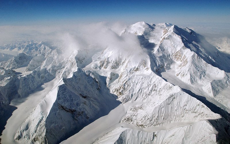 Spectacular Aerial View of a Great Mountain Range -- Snow-Covered Mountain Peaks In the Alaska Range, Including Mt. McKinley (Mt. Denali), the Highest Mountain and Highest Point on the North American Continent, April 21, 2002, State of Alaska, USA. Photo Credit: Senior Airman D. Myles Cullen, 1st Combat Camera, United States Air Force; Defense Visual Information Center (DVIC, http://www.DoDMedia.osd.mil, DFSD0405085 and 020421F0193C001) and United States Air Force (USAF, http://www.af.mil), United States Department of Defense (DoD, http://www.DefenseLink.mil or http://www.dod.gov), Government of the United States of America (USA).