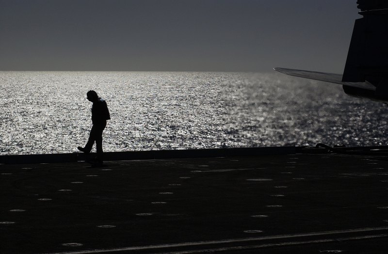 Waiting. Aboard the Aircraft Carrier USS Ronald Reagan (CVN 76), United States Navy, November 16, 2006. Pacific Ocean, State of California (Southern Area), USA. Photo Credit: Mass Communication Specialist 2nd Class Aaron Burden, Navy NewsStand � Eye on the Fleet Photo Gallery (http://www.news.navy.mil/view_photos.asp, 061116-N-7130B-071), United States Navy (USN, http://www.navy.mil), United States Department of Defense (DoD, http://www.DefenseLink.mil or http://www.dod.gov), Government of the United States of America (USA).