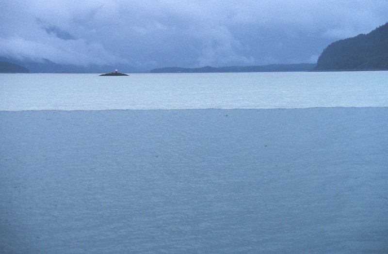 Where Glacial Melt-Water Meets Oceanic Water In the Saginaw Channel, the Change In Water Characteristics Is Abrupt and Visually Impressive, November 1991, State of Alaska, USA. Photo Credit: Commander John Bortniak, NOAA Corps; National Oceanic and Atmospheric Administration Photo Library (http://www.photolib.noaa.gov, corp1967), NOAA Corps Collection, NOAA Central Library, National Oceanic and Atmospheric Administration (NOAA, http://www.noaa.gov), United States Department of Commerce (http://www.commerce.gov), Government of the United States of America (USA).
