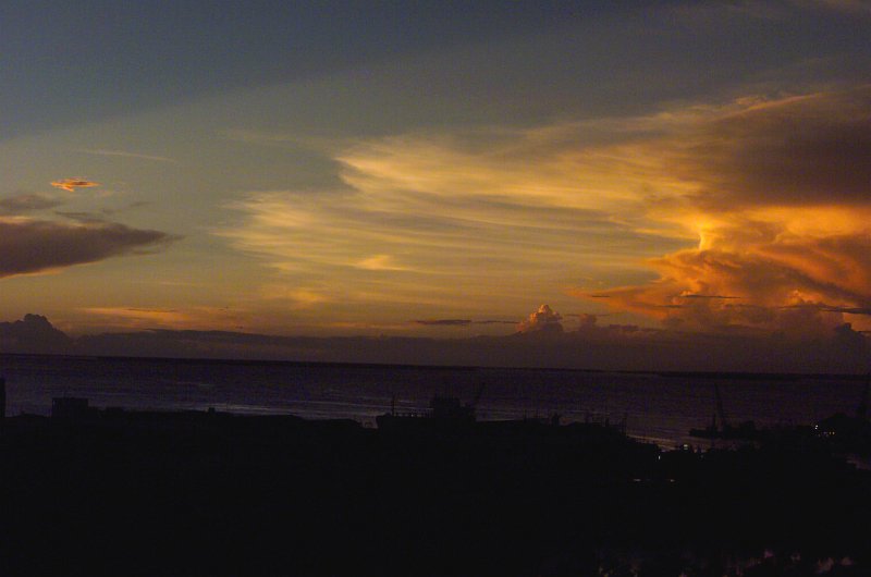 34. Sunset Merges Into Twilight Near the Beira International Airport (Aeroporto da Beira), March 22, 2000, Beira, Republica de Mocambique - Republic of Mozambique. Photo Credit: Staff Sgt. Robert A. Talenti, United States Air Force (USAF, http://www.af.mil); Defense Visual Information Center (DVIC, http://www.DoDMedia.osd.mil, DFSD0507959 and 000322F6200T529) and United States Air Force (USAF, http://www.af.mil), United States Department of Defense (DoD, http://www.DefenseLink.mil or http://www.dod.gov), Government of the United States of America (USA).