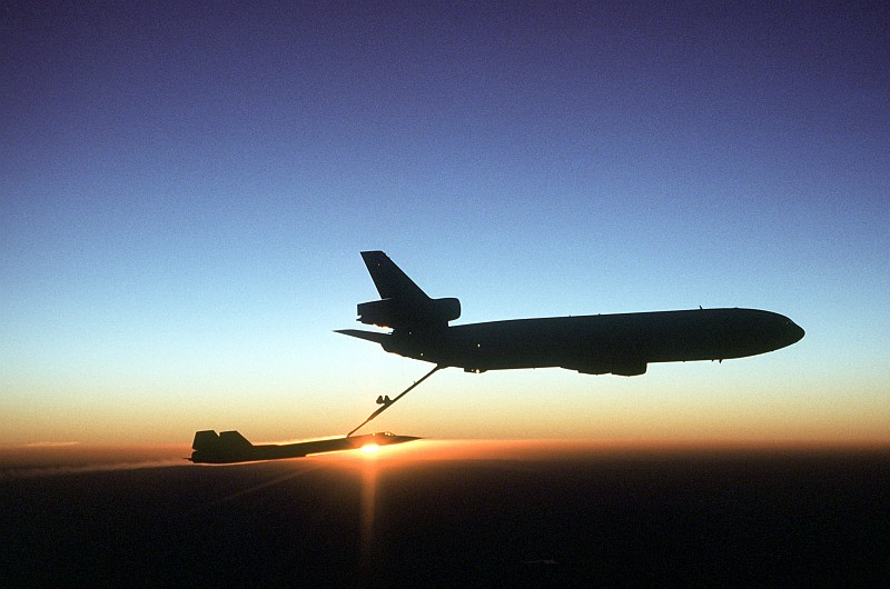 60. Another Beautiful, Golden Sunset On the Earth's Horizon as a USAF KC-10 Extender Aircraft Refuels the USAF SR-71 Blackbird Aircraft, August 2, 1981, Beale Air Force Base, State of California, USA. Photo Credit: Staff Sgt. Bill Thompson, United States Air Force (USAF, http://www.af.mil); Defense Visual Information Center (DVIC, http://www.DoDMedia.osd.mil, DFST8303356) and United States Air Force (USAF, http://www.af.mil), United States Department of Defense (DoD, http://www.DefenseLink.mil or http://www.dod.gov), Government of the United States of America (USA).