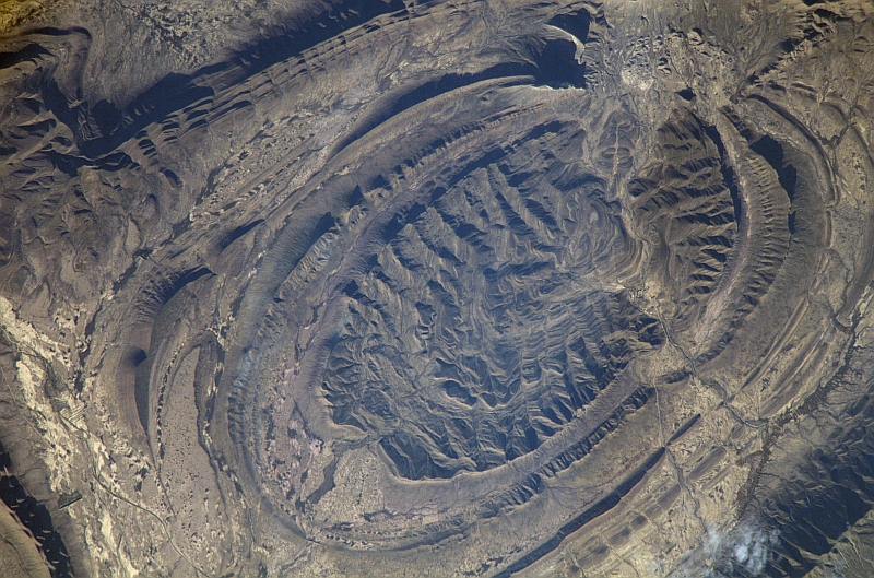 84. Late Afternoon Over a Geologic Fold Within the Fold Belt of the Sierra Madre Oriental Mountain Range (Fold Belt), December 8, 2007 at 22:05:33.367 GMT, Between State of Coahuila and State of Nuevo Leon, Estados Unidos Mexicanos - United Mexican States (Mexico), As Seen From the International Space Station (Expedition 16), Latitude (LAT): 26.4, Longitude (LON): -102.7, Altitude (ALT): 181 Nautical Miles, Sun Azimuth (AZI): 230 degrees, Sun Elevation Angle (ELEV): 21 degrees. Photo Credit: NASA; ISS016-E-15255, Geologic fold, Sierra Madre Oriental mountain range fold belt in Mexico, International Space Station (Expedition Sixteen); Image Science and Analysis Laboratory, NASA-Johnson Space Center. 'Astronaut Photography of Earth - Display Record.' <http://eol.jsc.nasa.gov/scripts/sseop/photo.pl?mission=ISS016&roll=E&frame=15255>; National Aeronautics and Space Administration (NASA, http://www.nasa.gov), Government of the United States of America (USA).