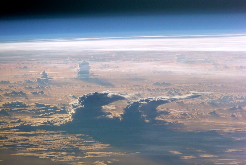 92. Morning Thunderstorm Anvils Over Matanitu ko Viti - Republic of the Fiji Islands and the South Pacific Ocean on December 2, 2000 at 20:28:24 GMT As Seen From the International Space Station (Expedition 1), Latitude (LAT): -17.0, Longitude (LON): 177.8, Altitude (ALT): 204 Nautical Miles, Sun Azimuth (AZI): 105 degrees, Sun Elevation Angle (ELEV): 40 degrees. Photo Credit: NASA; ISS001-E-5820, Earth's atmospheric limb, Morning over the South Pacific Ocean, Clouds, Thunderstorm anvils, Fiji, Fiji Islands, International Space Station (Expedition One); Image Science and Analysis Laboratory, NASA-Johnson Space Center. 'Astronaut Photography of Earth - Display Record.' <http://eol.jsc.nasa.gov/scripts/sseop/photo.pl?mission=ISS001&roll=E&frame=5820>; National Aeronautics and Space Administration (NASA, http://www.nasa.gov), Government of the United States of America (USA).