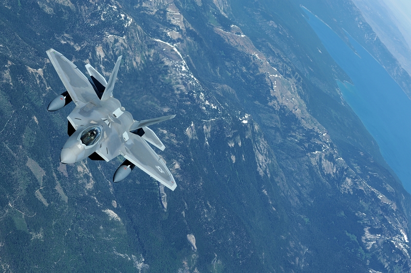 22. A U.S Air Force F-22A Raptor Stealth Fighter Jet Flies Overland While Traveling From Hill Air Force Base, Utah, to Joint Base Pearl Harbor-Hickam, Hawaii, USA, July 2, 2010. Photo Cedit: Senior Airman Gustavo Gonzalez, United States Air Force; Air Force Link - Photos (http://www.af.mil/photos, 100702-F-4815G-107), United States Air Force (USAF, http://www.af.mil), United States Department of Defense (DoD, http://www.DefenseLink.mil or http://www.dod.gov), Government of the United States of America (USA).