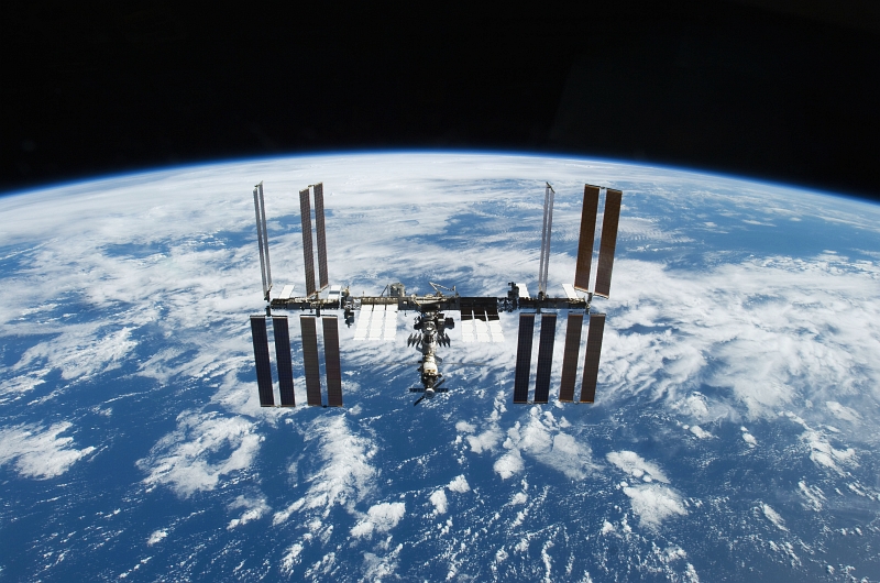 9. The International Space Station Orbits Over A Blue-and-White Earth, Backdropped By the Blackness of Space, November 25, 2009, As Seen From Space Shuttle Atlantis (STS-129). Photo Credit: NASA; STS-129 Shuttle Mission Imagery (http://spaceflight.nasa.gov/gallery/images/shuttle/sts-129/ndxpage1.html), S129-E-009327 (http://spaceflight.nasa.gov/gallery/images/shuttle/sts-129/html/s129e009327.html), NASA Human Space Flight (http://spaceflight.nasa.gov), National Aeronautics and Space Administration (NASA, http://www.nasa.gov), Government of the United States of America.