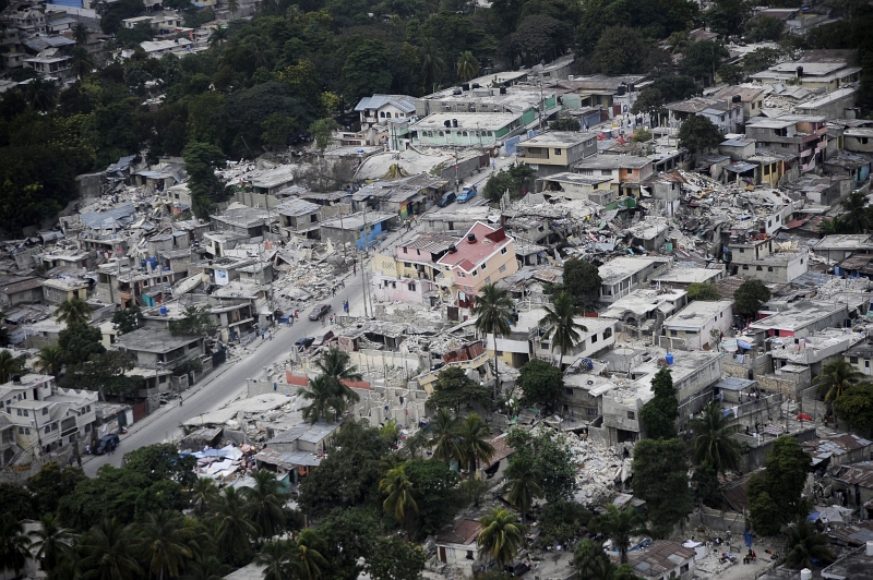 36. Earthquake-Damaged Houses, January 19, 2010, Republique d'Haiti (Repiblik d' Ayiti) - Republic of Haiti. Photo Credit: Technical Sgt. (TSgt) Dennis J. Henry Jr., United States Air Force; Defense Visual Information (DVI, http://www.DefenseImagery.mil, 100119-F-3715H-248) and United States Air Force (USAF, http://www.af.mil), United States Department of Defense (DoD, http://www.DefenseLink.mil or http://www.dod.gov), Government of the United States of America (USA).