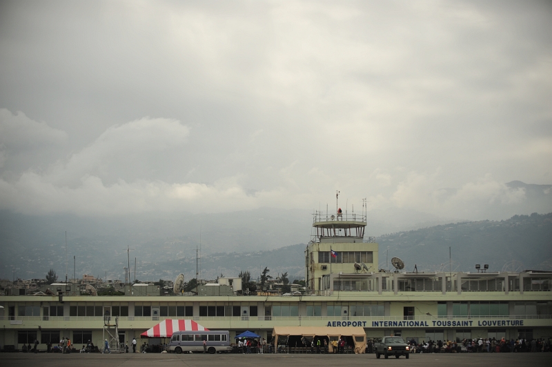 28. Badly Damaged Air Traffic Control Tower, January 19, 2010, Aeroport International Toussaint Louverture, Port-au-Prince, Republique d'Haiti (Repiblik d' Ayiti) - Republic of Haiti. Photo Credit: Staff Sgt. Joshua L. DeMotts, United States Air Force; Defense Visual Information (DVI, http://www.DefenseImagery.mil, 100119-F-3759D-326) and United States Air Force (USAF, http://www.af.mil), United States Department of Defense (DoD, http://www.DefenseLink.mil or http://www.dod.gov), Government of the United States of America (USA).