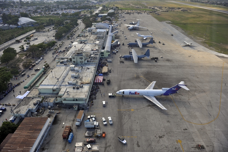 54. Aerial View of the Busy Toussaint Louverture International Airport, January 23, 2010, Republique d'Haiti (Repiblik d' Ayiti) - Republic of Haiti. Photo Credit: Staff Sgt. Desiree N. Palacios, Air Force Link (AFLink) Photos (http://www.af.mil/photos, 100123-F-1830P-258, 'Combat controllers at work'), United States Air Force (USAF, http://www.af.mil), United States Department of Defense (DoD, http://www.DefenseLink.mil or http://www.dod.gov), Government of the United States of America (USA).