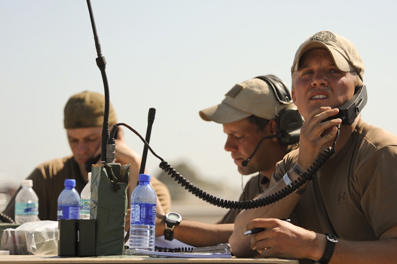 51.  U.S. Air Force Combat Controllers (From the 23rd Special Tactics Squadron at Hurlburt Field, Florida, USA) -- They Are U.S. Air Force Special Forces Air Traffic Controllers -- Communicating With Aircraft Circling Above Toussaint Louverture International Airport, January 23, 2010, Republique d'Haiti (Repiblik d' Ayiti) - Republic of Haiti. Photo Credit: Staff Sgt. Desiree N. Palacios, Air Force Link (AFLink) Photos (http://www.af.mil/photos, 100123-F-1830P-383, 'Combat controllers at work'), United States Air Force (USAF, http://www.af.mil), United States Department of Defense (DoD, http://www.DefenseLink.mil or http://www.dod.gov), Government of the United States of America (USA).