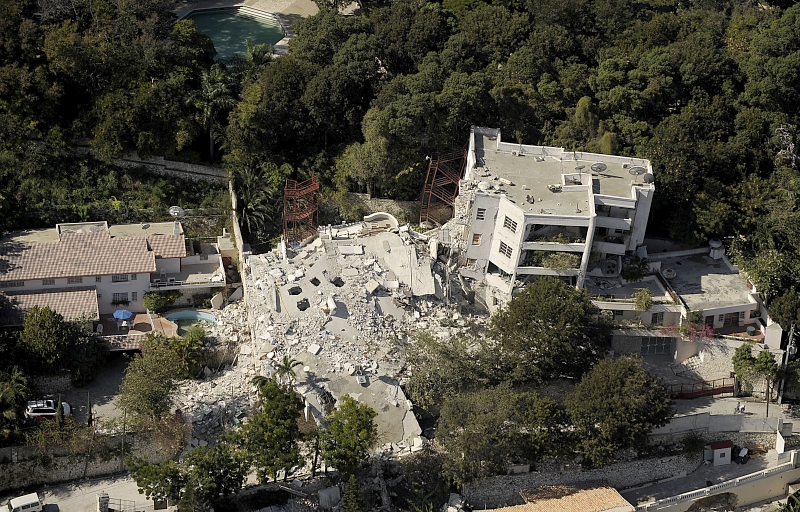 46. A Heavily Damaged Building, January 23, 2010, Republique d'Haiti (Repiblik d' Ayiti) - Republic of Haiti.  Photo Credit: Master Sgt. Russell E. Cooley IV, United States Air Force; Defense Visual Information (DVI, http://www.DefenseImagery.mil, 100123-F-9712C-0104) and United States Air Force (USAF, http://www.af.mil), United States Department of Defense (DoD, http://www.DefenseLink.mil or http://www.dod.gov), Government of the United States of America (USA).