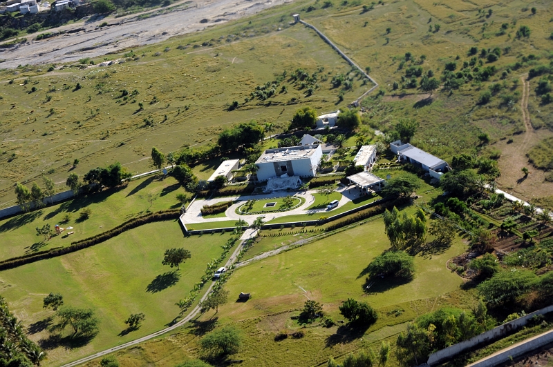 3. January 13, 2010: Aerial photo of a building damaged by the magnitude 7.0 earthquake in Republique d'Haiti (Repiblik d' Ayiti) - Republic of Haiti on January 12, 2010. Photo Credit: Petty Officer 2nd Class Sondra-Kay Kneen, United States Coast Guard (USCG, http://www.uscg.mil) Visual Information Gallery (http://cgvi.uscg.mil/media/main.php, 100113-G-7070K-004), United States Department of Homeland Security (DHS, http://www.dhs.gov), Government of the United States of America (USA).