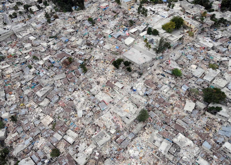 55. Homes Destroyed, Houses Devastated, Collapsed Buildings, Rubble and Ruins -- Everywhere, February 1, 2010, Port-au-Prince, Republique d'Haiti (Repiblik d' Ayiti) - Republic of Haiti. Photo Credit: Senior Chief Mass Communication Specialist Spike Call, United States Navy; Defense Visual Information (DVI, http://www.DefenseImagery.mil, 100201-N-5961C-003) and United States Navy (USN, http://www.navy.mil), United States Department of Defense (DoD, http://www.DefenseLink.mil or http://www.dod.gov), Government of the United States of America (USA).